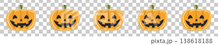 A line of Halloween decorations featuring smiling jack-o'-lanterns and sparsely arranged candy. 138618188