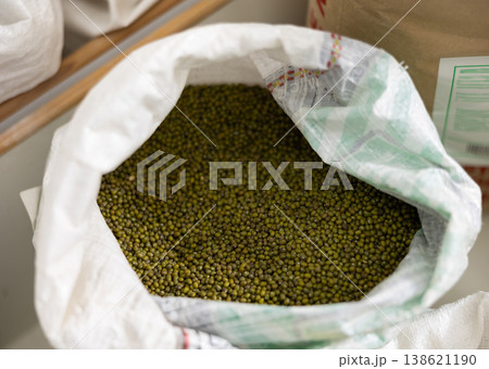 Sacks of green soybeans at food market 138621190
