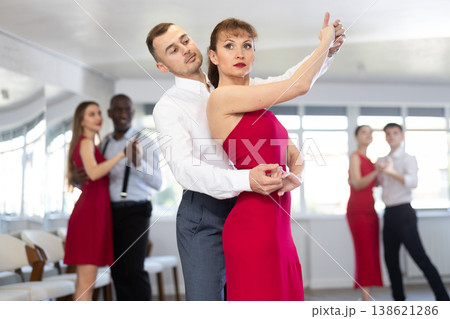 Adult man and adult woman dance waltz Adult man and adult woman dance waltz 138621286