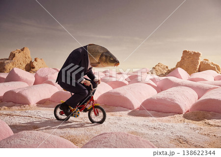 Fish head man rides a small bike. He rides...のイラスト素材 [138622344] - PIXTA