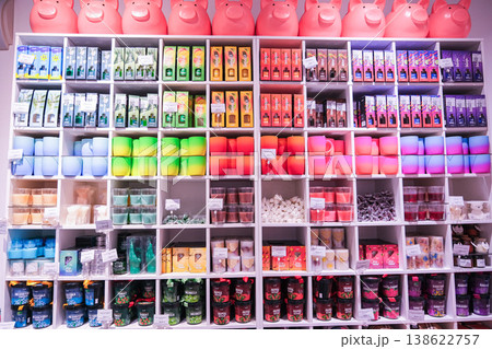 A store with many colorful items on shelves, including a pink pig 138622757