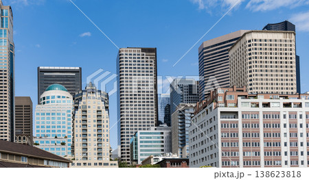 Skyscraper in city downtown. City skyline architecture. Office building in business district. Residential building. Skyscraper building architecture. Skyscraper cityscape skyline. Urban cityscape Skyscraper in city downtown. City skyline architecture. Office building in business district. Residential building. Skyscraper building architecture. Skyscraper cityscape skyline. Urban cityscape 138623818