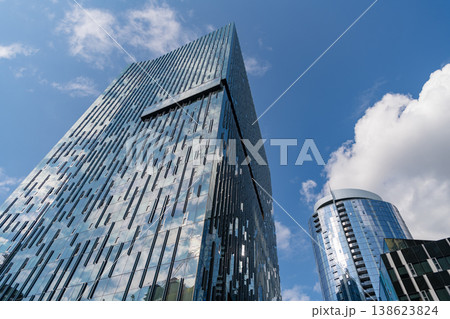 City architecture. Architecture of office building. Perspective skyscraper. Commercial architecture. Business skyscraper building. Architectural building business area. Innovative glass design City architecture. Architecture of office building. Perspective skyscraper. Commercial architecture. Business skyscraper building. Architectural building business area. Innovative glass design 138623824
