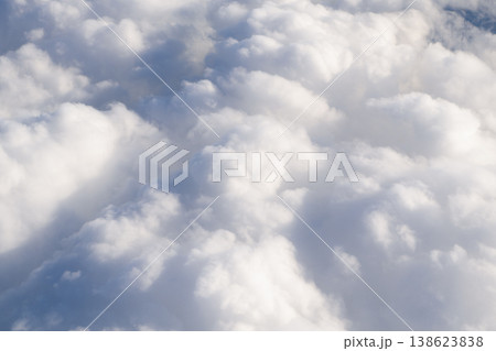 Cloud and cloudscape aerial sky. Aerial cloudscape view covered with cloud. Aerial cloudy sky view. Cloud view from plane. Sky in cloud. Cloudscape with cloudy weather. Nebulosity background Cloud and cloudscape aerial sky. Aerial cloudscape view covered with cloud. Aerial cloudy sky view. Cloud view from plane. Sky in cloud. Cloudscape with cloudy weather. Nebulosity background 138623838