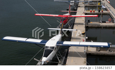 Vancouver, Canada - May 29, 2019: Plane waterfront station. Cessna 206 seaplane. Cessna 206 plane in seaplane terminal. Vancouver harbor airport. Seaplane tour. Retro planes in harbor Vancouver, Canada - May 29, 2019: Plane waterfront station. Cessna 206 seaplane. Cessna 206 plane in seaplane terminal. Vancouver harbor airport. Seaplane tour. Retro planes in harbor 138623857