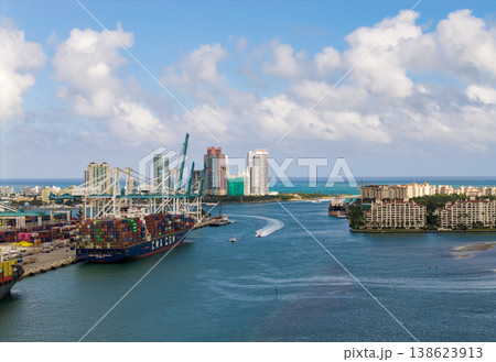Miami, Florida - February 12, 2025: Aerial Miami port with cargo container. Export and import. Port of Miami. Cargo ship loaded with container in Miami, aerial. Freight container. Cargo terminal Miami, Florida - February 12, 2025: Aerial Miami port with cargo container. Export and import. Port of Miami. Cargo ship loaded with container in Miami, aerial. Freight container. Cargo terminal 138623913