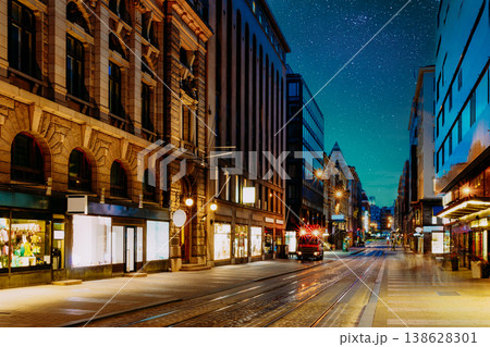 Helsinki, Finland. Night View Of Aleksanterinkatu Street In Kluuvi District In Evening Or Night Illumination. Illuminated City Street in Helsinki at Night Helsinki, Finland. Night View Of Aleksanterinkatu Street In Kluuvi District In Evening Or Night Illumination. Illuminated City Street in Helsinki at Night 138628301