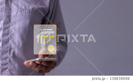 Customer Review, Young Man hand holding Smart Phone with five star to review and give 5 stars with very good results in service, Good review 5 star rating choice feedback 138630098