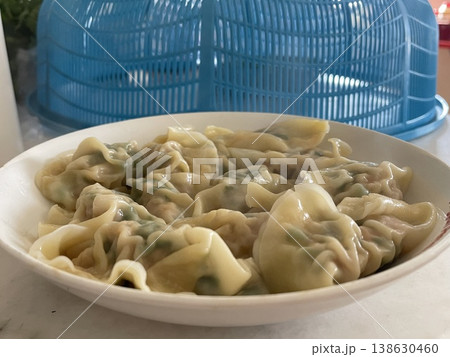 Plate Of Freshly Boiled Cooked Pork And Vegetable Dumplings Plate Of Freshly Boiled Cooked Pork And Vegetable Dumplings 138630460