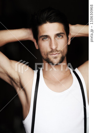 Hipster, artist and portrait of man in studio, dark background and mockup of creative person. Serious, face and confident musician relax with jazz, music or listening to recording of moody song 138630968