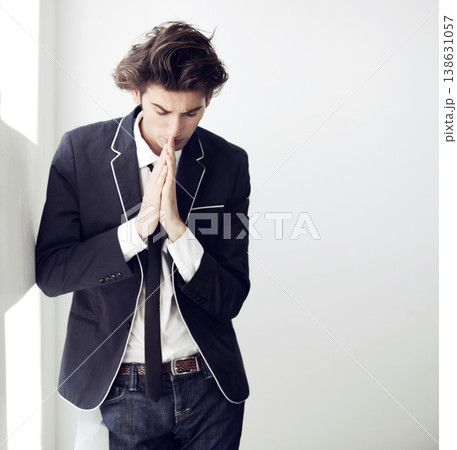 Thinking, fear and a businessman with a prayer in the office for support, hope and trust. Serious, idea and a young corporate employee with spiritual help for a decision or fail in the workplace Thinking, fear and a businessman with a prayer in the office for support, hope and trust. Serious, idea and a young corporate employee with spiritual help for a decision or fail in the workplace 138631057
