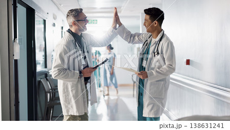 Doctors, men and high five in hospital, teamwork and together for collaboration, goals and support. Medical teamwork, congratulations and happy for success on tablet, document or motivation in clinic Doctors, men and high five in hospital, teamwork and together for collaboration, goals and support. Medical teamwork, congratulations and happy for success on tablet, document or motivation in clinic 138631241