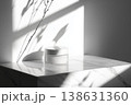 Minimalist Skincare Product Display on Marble Surface with Natural Shadows 138631360