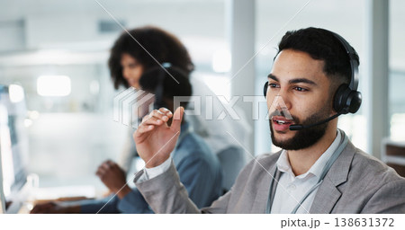 Happy businessman, call center and customer service in telemarketing, communication or support at office. Friendly man, consultant or agent smile in online advice, help or contact us at workplace 138631372