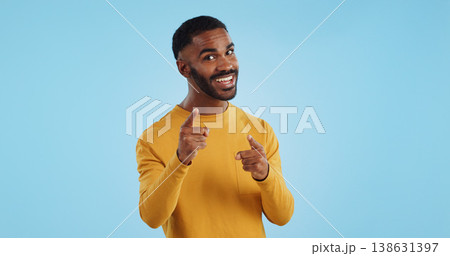 Face, excited and black man pointing at you for decision, choice or selection in studio isolated on a blue background mockup space. Portrait, hand gesture and person hiring, recruitment or invitation 138631397