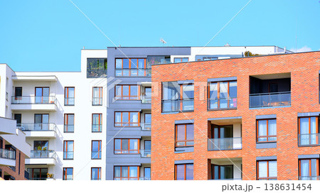 Apartments in residential complex. Housing structure at modern house. Architecture for property investment. and architecture details. Urban abstract - windows of apartment building. Apartments in residential complex. Housing structure at modern house. Architecture for property investment. and architecture details. Urban abstract - windows of apartment building. 138631454