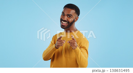 Face, excited and black man pointing at you for decision, choice or selection in studio isolated on a blue background mockup space. Portrait, hand gesture and person hiring, recruitment or invitation 138631495