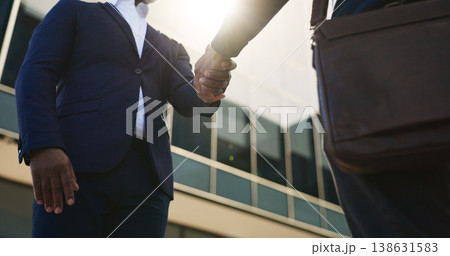 Handshake, city and business people in morning by building for career, job and work opportunity. Professional, teamwork and workers shaking hands for agreement, thank you and b2b deal for success Handshake, city and business people in morning by building for career, job and work opportunity. Professional, teamwork and workers shaking hands for agreement, thank you and b2b deal for success 138631583