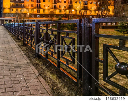 Decorative Black Metal Fence with City Building at Night 138632469