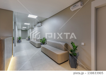 Modern Clinic Hallway with Reception and Seating 138633905