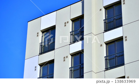 Apartments in residential complex. Housing structure at modern house. Architecture for property investment. and architecture details. Urban abstract - windows of apartment building. Apartments in residential complex. Housing structure at modern house. Architecture for property investment. and architecture details. Urban abstract - windows of apartment building. 138633969