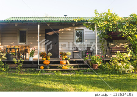Garden house with terrace on sunny autumn day Garden house with terrace on sunny autumn day 138634198