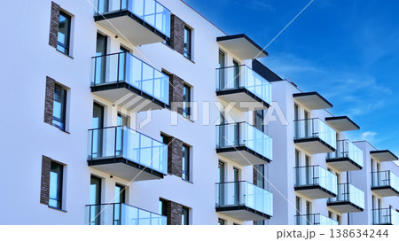 Apartments in residential complex. Housing structure at modern house. Architecture for property investment. and architecture details. Urban abstract - windows of apartment building. Apartments in residential complex. Housing structure at modern house. Architecture for property investment. and architecture details. Urban abstract - windows of apartment building. 138634244