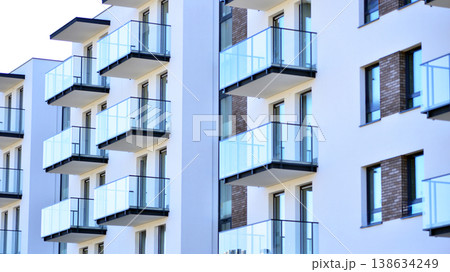 Apartments in residential complex. Housing structure at modern house. Architecture for property investment. and architecture details. Urban abstract - windows of apartment building. Apartments in residential complex. Housing structure at modern house. Architecture for property investment. and architecture details. Urban abstract - windows of apartment building. 138634249