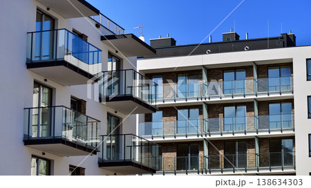 Apartments in residential complex. Housing structure at modern house. Architecture for property investment. and architecture details. Urban abstract - windows of apartment building. Apartments in residential complex. Housing structure at modern house. Architecture for property investment. and architecture details. Urban abstract - windows of apartment building. 138634303