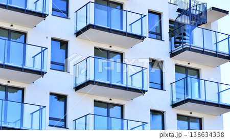 Apartments in residential complex. Housing structure at modern house.  Architecture for property investment. and architecture details. Urban abstract - windows of apartment building. 138634338