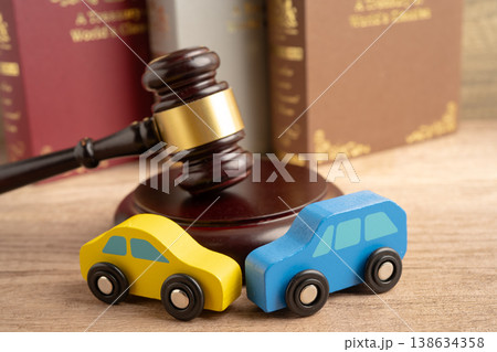 Car accident lawsuit and insurance, Judge hammer with car model. Car accident lawsuit and insurance, Judge hammer with car model. 138634358