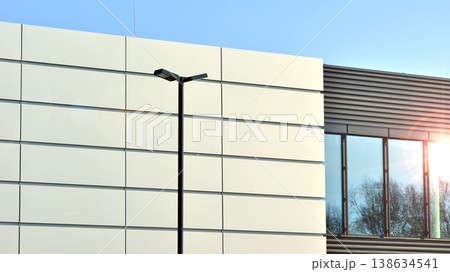 Empty new constructed automobile dealership. The building contains a sales room, offices, service and parts warehouse. Empty new constructed automobile dealership. The building contains a sales room, offices, service and parts warehouse. 138634541
