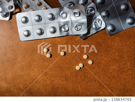 Used Blister Packs with Yellow Pills and Copy Space Used Blister Packs with Yellow Pills and Copy Space 138634705