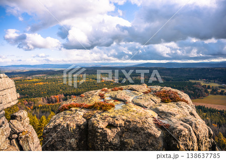 Explore stunning lookout points at Southern Terraces in Stolowe Mountains National Park, Poland. Autumn colors highlight the unique sandstone formations against a vibrant sky. Explore stunning lookout points at Southern Terraces in Stolowe Mountains National Park, Poland. Autumn colors highlight the unique sandstone formations against a vibrant sky. 138637785