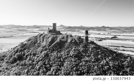 Discover the ancient Hazmburk Castle ruins nestled in the Central Bohemian Uplands of Czechia. The structures rise prominently above the surrounding hills and valleys. Discover the ancient Hazmburk Castle ruins nestled in the Central Bohemian Uplands of Czechia. The structures rise prominently above the surrounding hills and valleys. 138637943