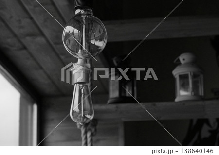 Vintage light bulbs suspended from a wire. Hanging retro incandescent lamps. closeup of photo Vintage light bulbs suspended from a wire. Hanging retro incandescent lamps. closeup of photo 138640146