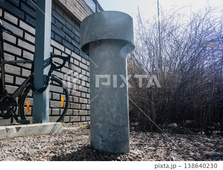 Concrete bollard barrier in urban outdoor space with bicycle parking area safety infrastructure concept Concrete bollard barrier in urban outdoor space with bicycle parking area safety infrastructure concept 138640230