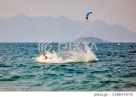 Kitesurfer wipeout sends dramatic spray across sea Kitesurfer wipeout sends dramatic spray across sea 138641678