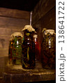 Herbal remedies made by medicine men using jars filled with snakes and other organic materials 138641722