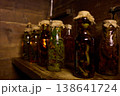Herbal remedies made by medicine men using jars filled with snakes and other organic materials 138641724