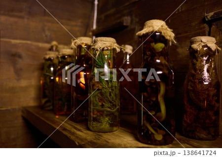 Herbal remedies made by medicine men using jars filled with snakes and other organic materials Herbal remedies made by medicine men using jars filled with snakes and other organic materials 138641724