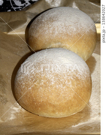 Home made bread roll baps freshly cooked with flour sprinkled on top Home made bread roll baps freshly cooked with flour sprinkled on top 138642027