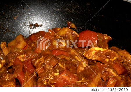 Close up of a red spicy Indian style home made curry dish Close up of a red spicy Indian style home made curry dish 138642050