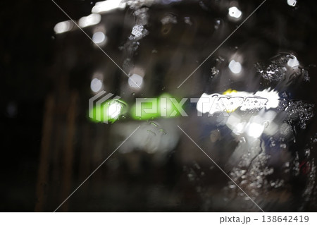 Close-up of raindrops on a window pane. 138642419