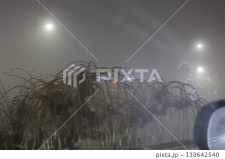 Evening fog in the city. 138642540