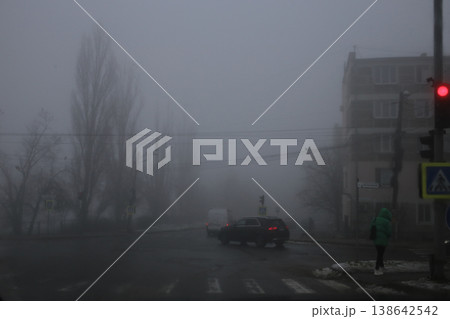 Evening fog in the city. Evening fog in the city. 138642542
