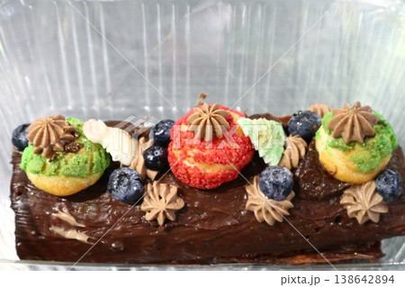 Traditional chocolate trunk cake or log cake. Traditional chocolate trunk cake or log cake. 138642894