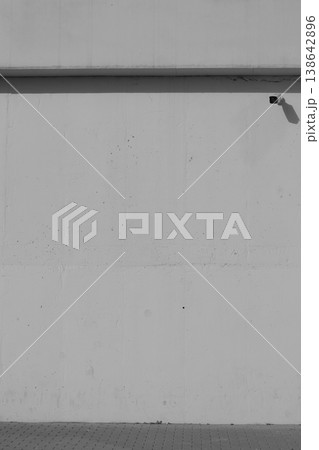 Outdoor video surveillance on a white wall. 138642896