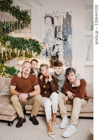 Family gathering in a modern living room during the holiday season 138644100