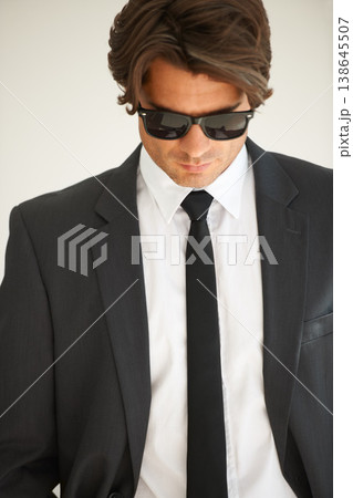 Business, attitude and confident man in office with glasses, attitude or empowered on wall background. Leader, mindset and cool male entrepreneur thinking, edgy and posing with leadership or focus Business, attitude and confident man in office with glasses, attitude or empowered on wall background. Leader, mindset and cool male entrepreneur thinking, edgy and posing with leadership or focus 138645507